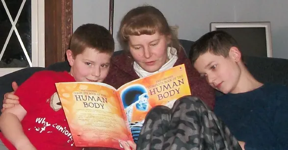 Heather reading to boys